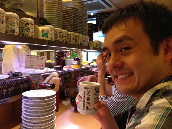 Naoto at conveyor belt sushi