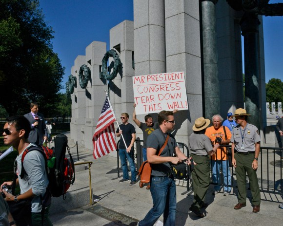 protesters at world war 2 memorial