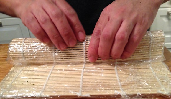 making sushi at home, rolling sushi