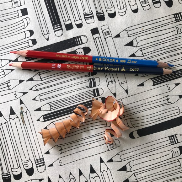 caran d'ache and mitsubishi red and blue pencils