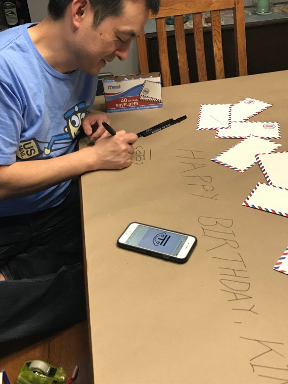 letter writing party decorations, letters & libations, paper decorations, mail decorations, kraft paper tablecloth, post office in many languages