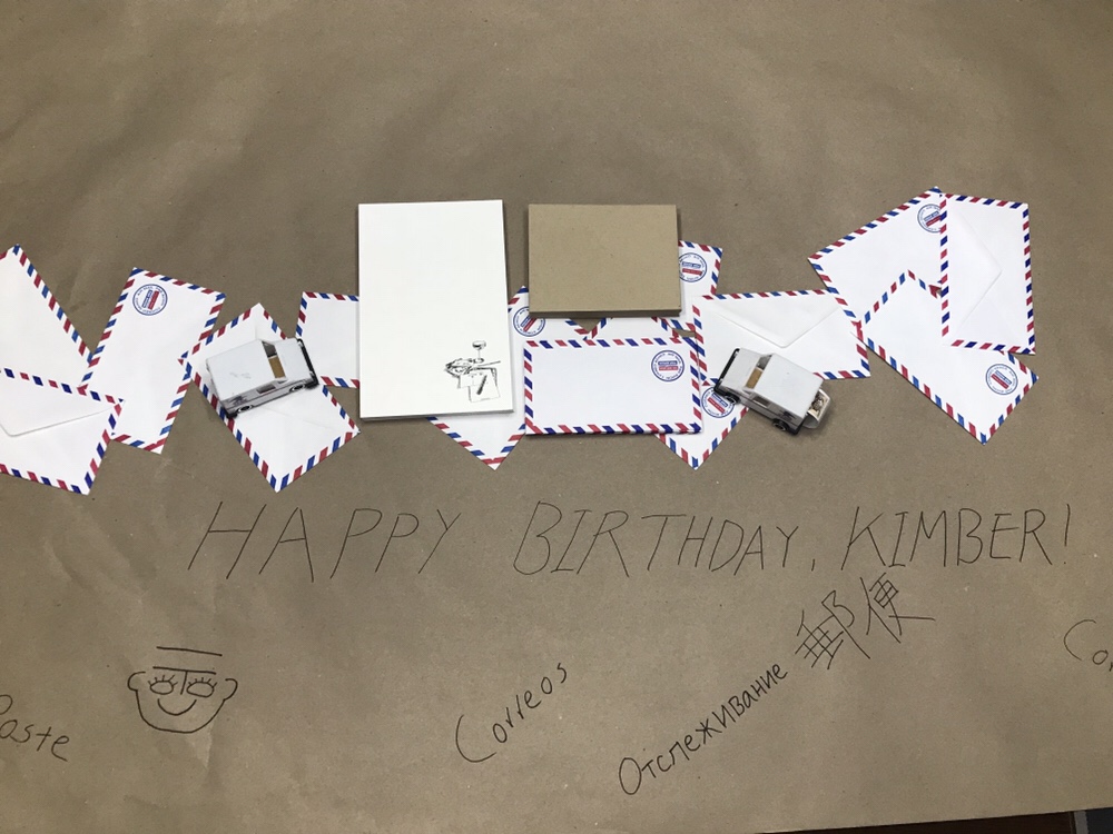 letter writing party decorations, letters & libations, paper decorations, mail decorations, kraft paper tablecloth, post office in many languages