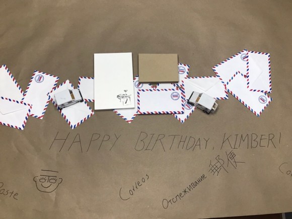 letter writing party decorations, letters & libations, paper decorations, mail decorations, kraft paper tablecloth, post office in many languages