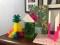 tiki birthday party, aloha birthday, #jktikiparty, tiki party, table setting, leis, gift wrap, paper source gift wrap, flamingo,&nbsp;pineapple