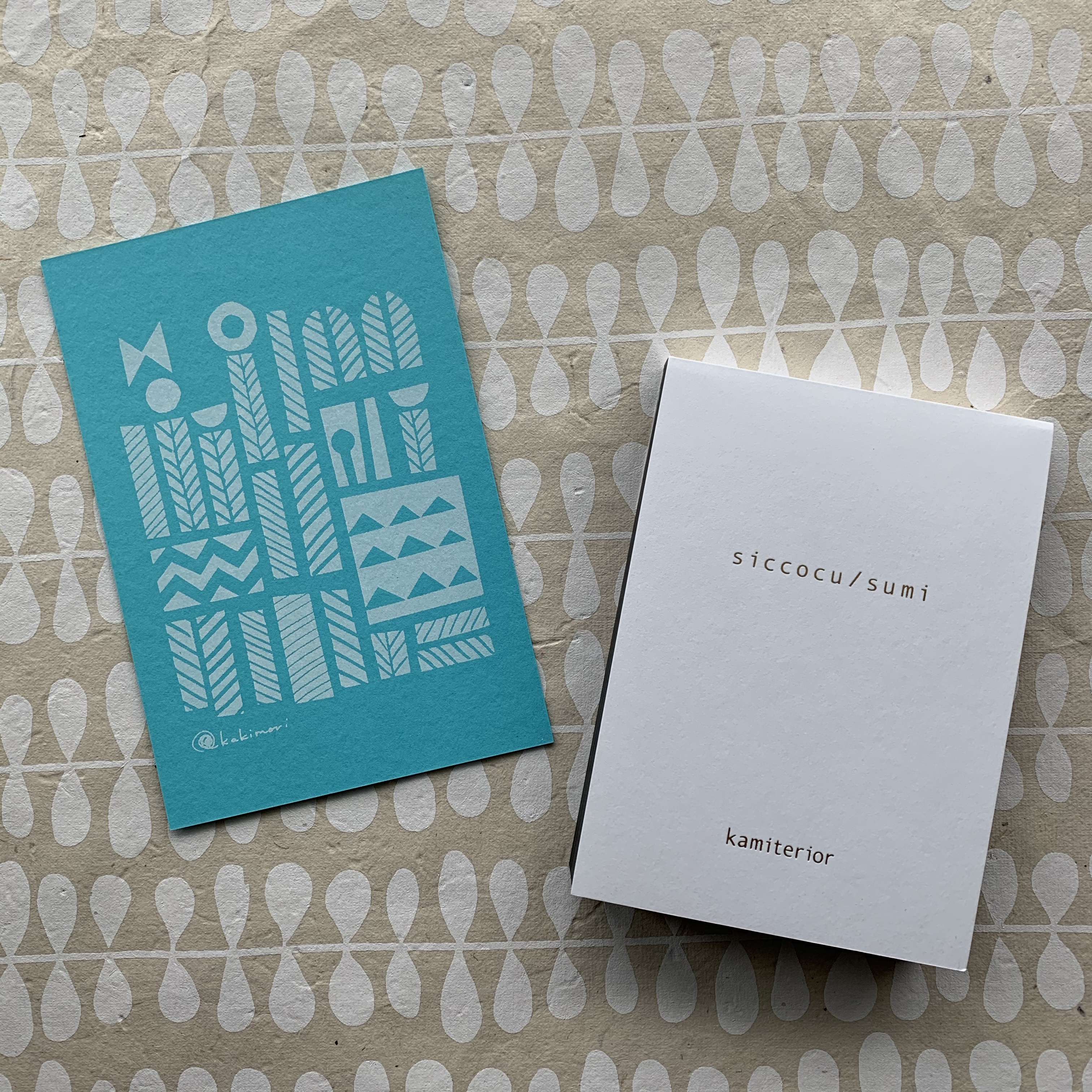 kakimori postcard, black paper notes
